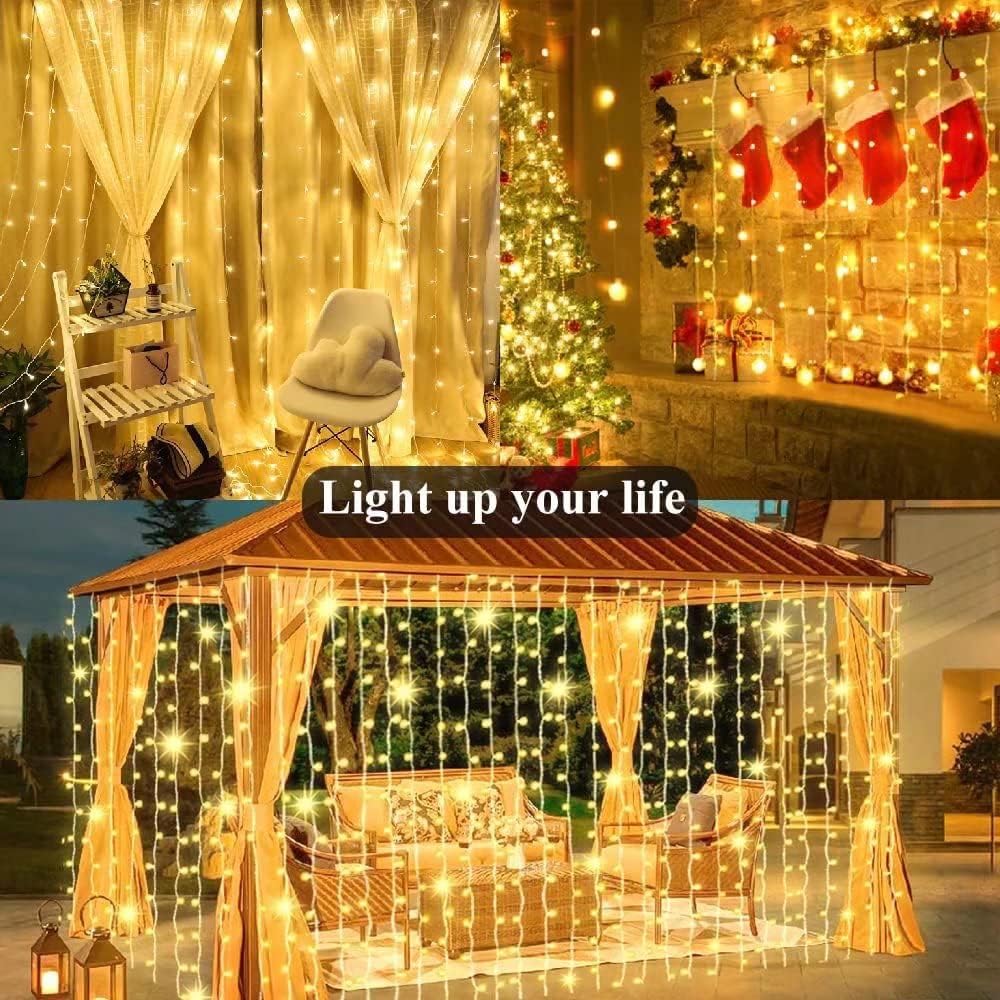 Upgraded Solar Curtain Lights Remote Control, Outdoor Garden Lights 300 LED 8 Modes Waterproof Solar Waterfall Fairy String Lights Decoration for Christmas Patio Garden Party Wedding (Warm White)